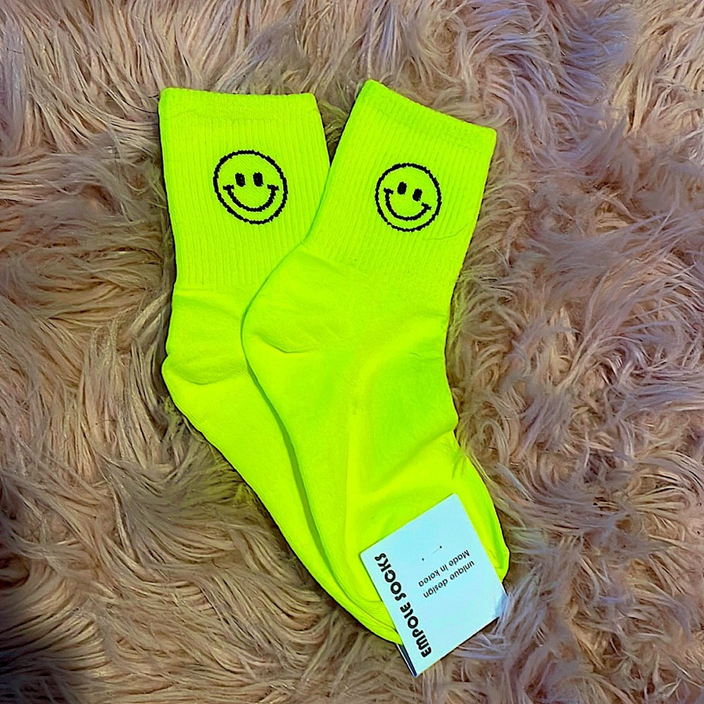 Brand new neon yellow smiley face socks.